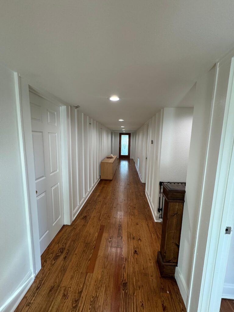 Professional house painters working on a home in St. Petersburg, FL